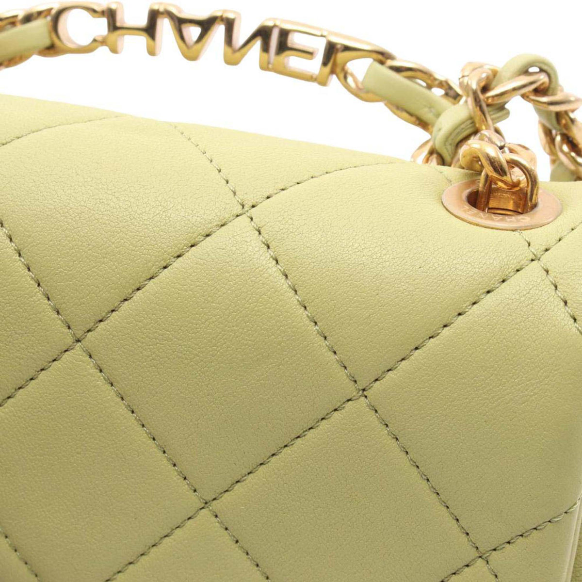 Chanel Mini Quilted Lambskin Oval Logo Chain Top Handle Flap