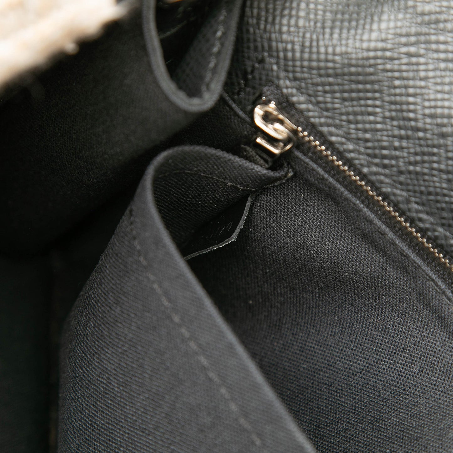 Louis Vuitton Taiga Belaia Clutch