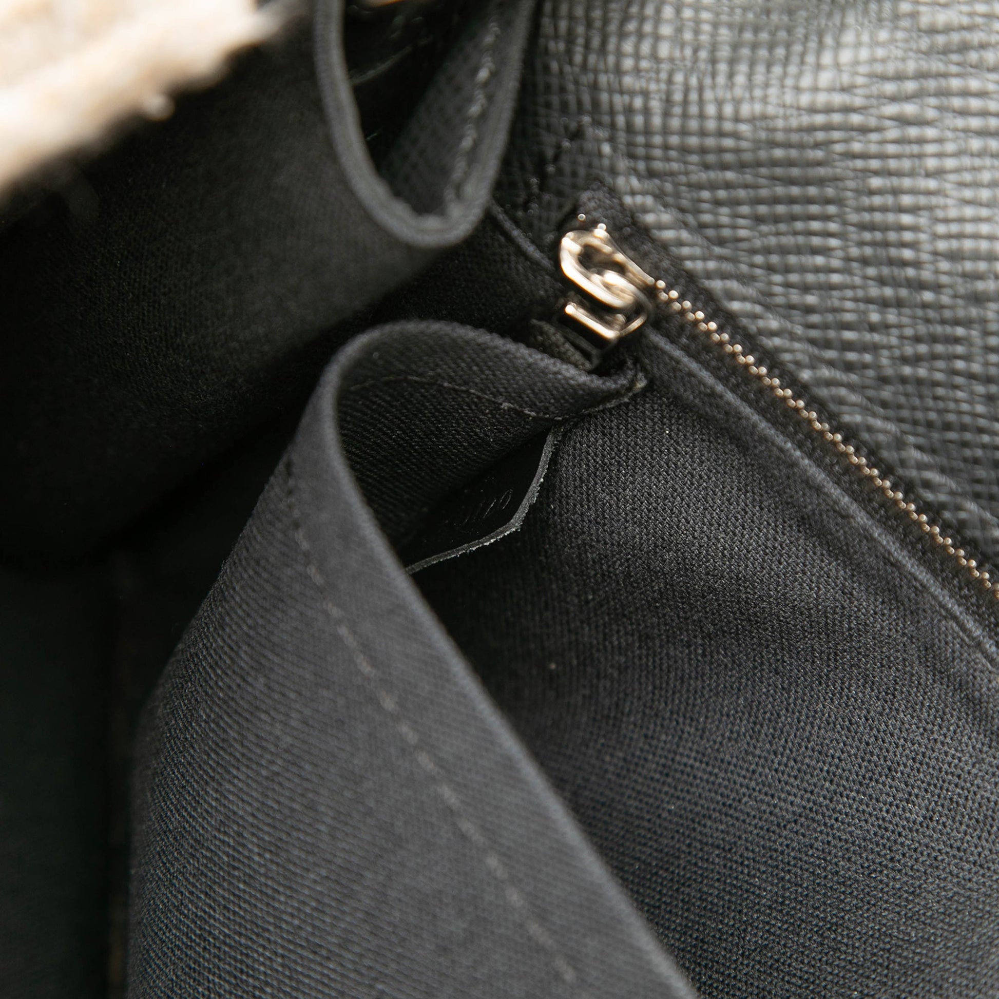 Louis Vuitton Taiga Belaia Clutch