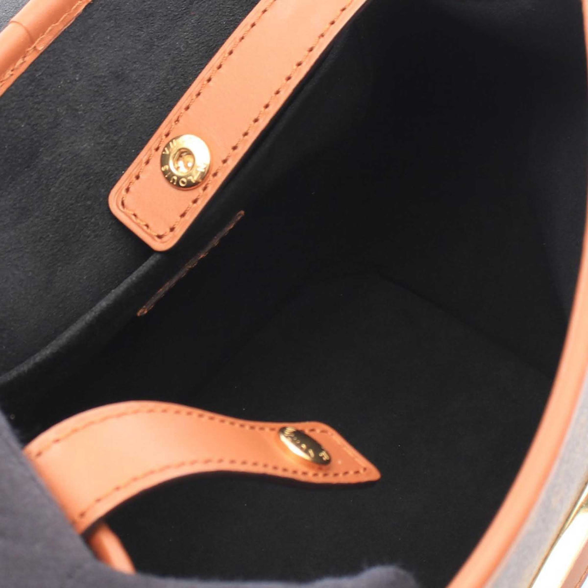 Louis Vuitton Monogram Reverse Dauphine Backpack PM