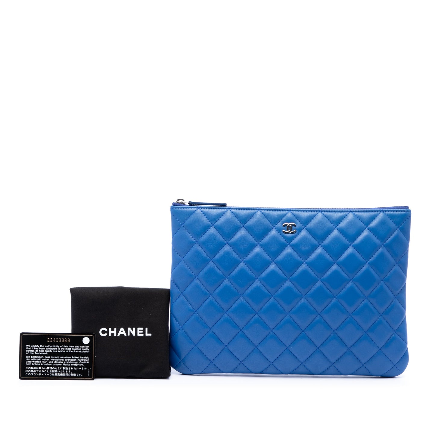 Chanel Medium Quilted Lambskin O Case Clutch