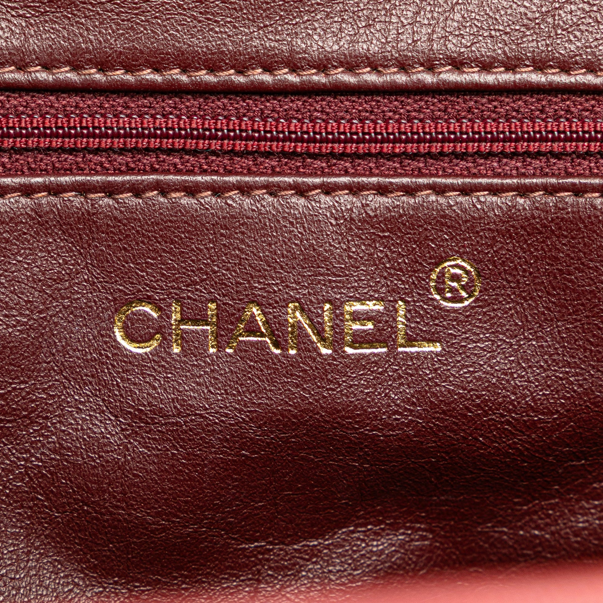 Chanel Quilted Suede Metal Frame Handbag