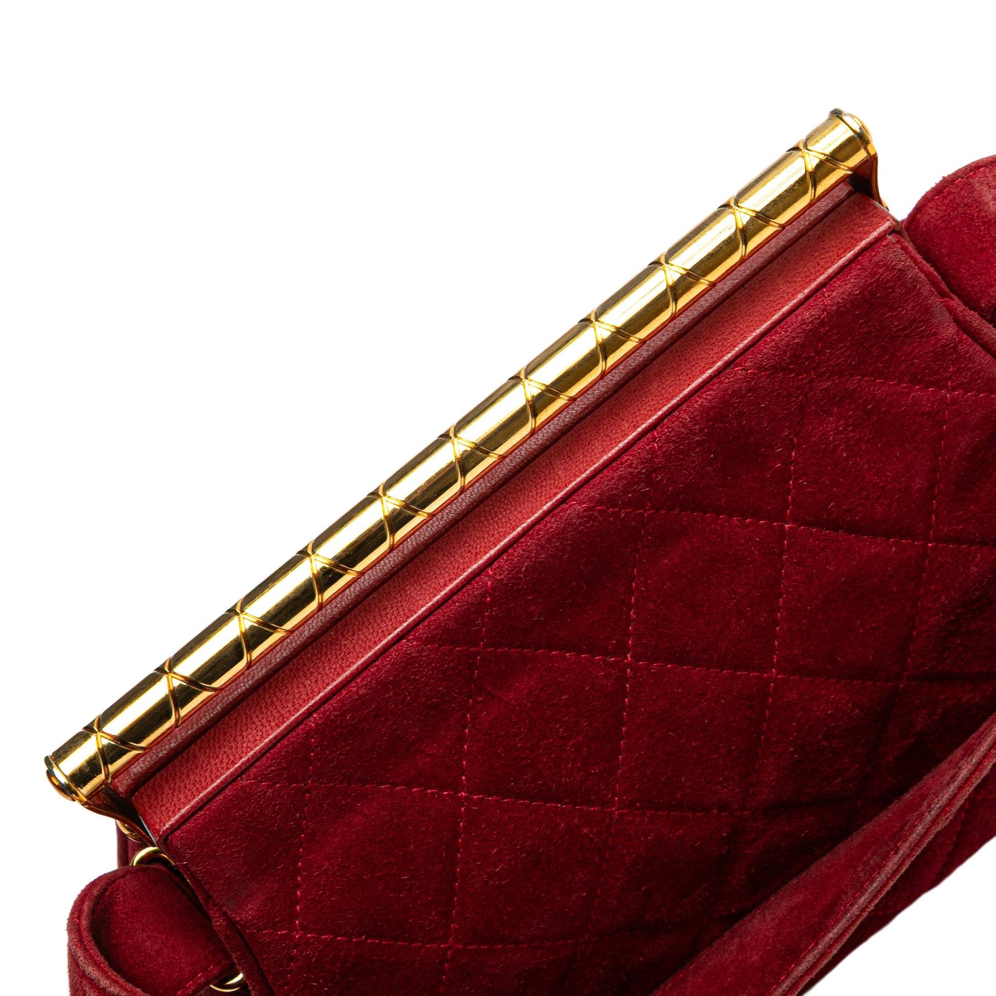 Chanel Quilted Suede Metal Frame Handbag