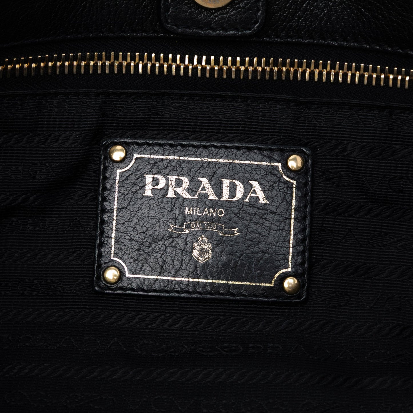 Tessuto Whipstitched Logo Oro Tassel Satchel