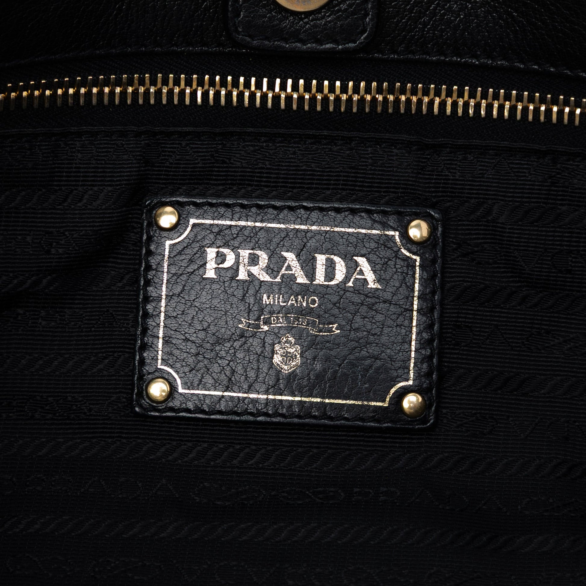 Tessuto Whipstitched Logo Oro Tassel Satchel