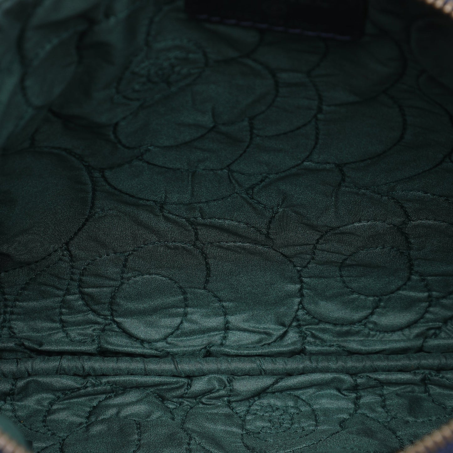 Chanel Medium CC Embossed Lambskin Camellia O Case Clutch