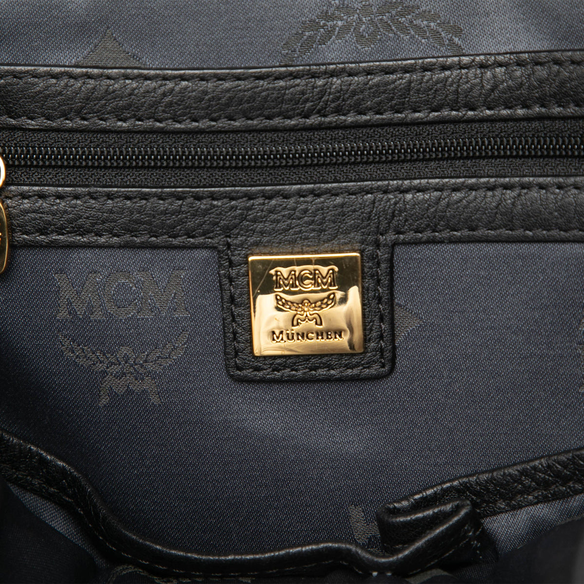 MCM Small Visetos Coated Canvas Studded Stark Brock Backpack — Black