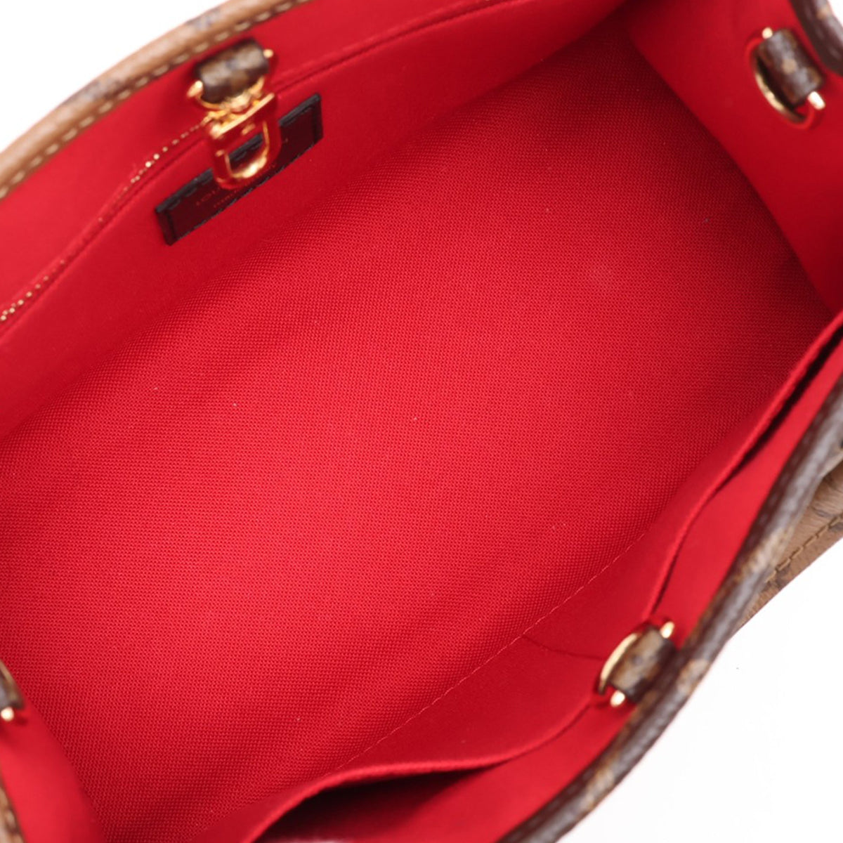 Louis Vuitton Monogram Reverse Giant OnTheGo PM — Brown