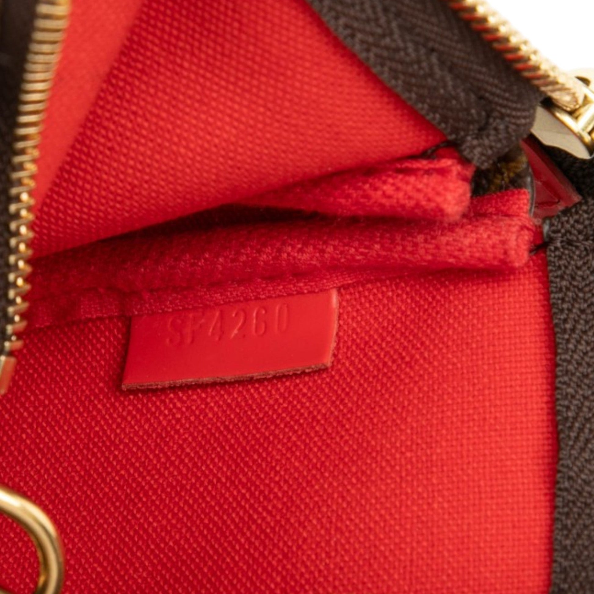 Louis Vuitton Monogram Vivienne Christmas Mini Pochette Accessoires