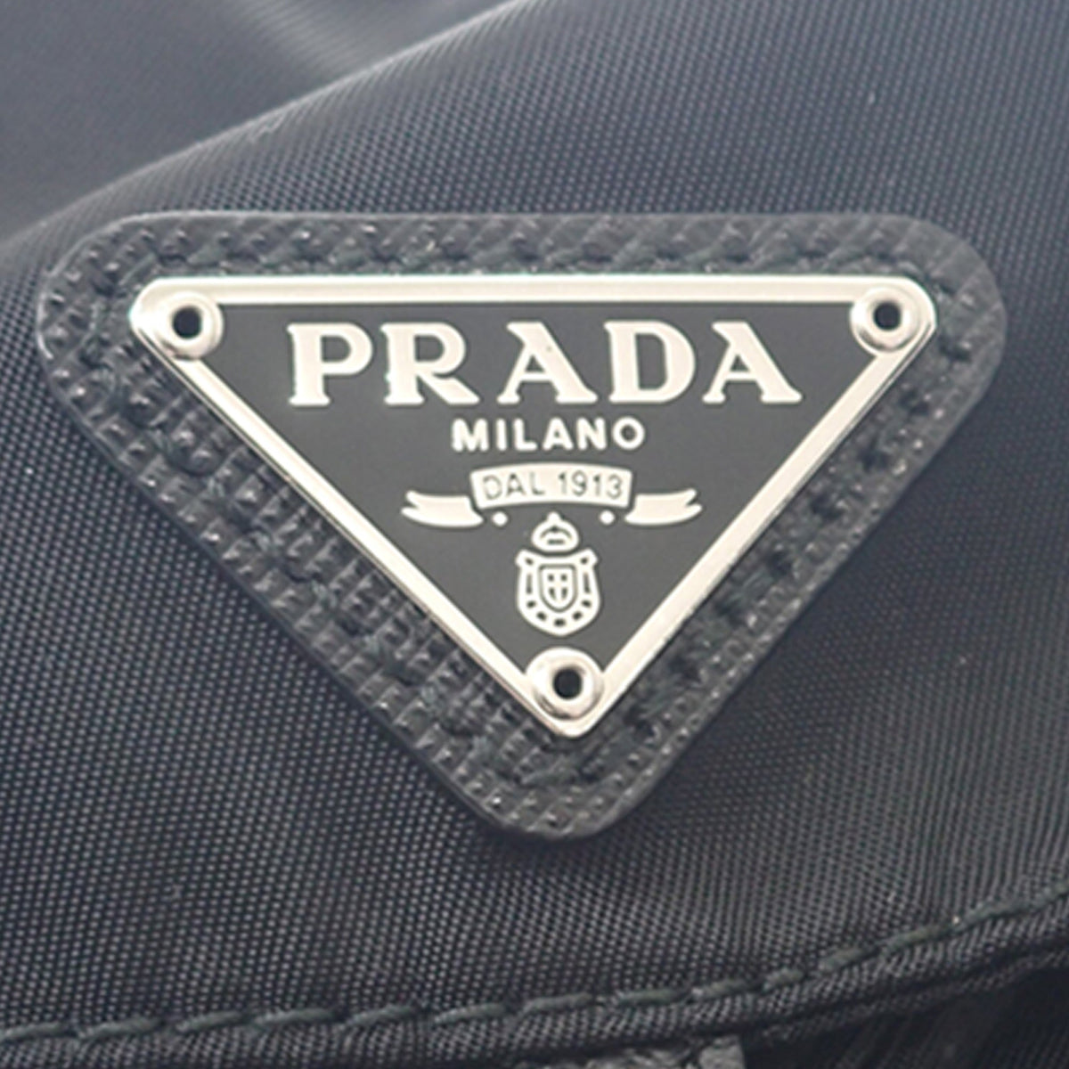 Prada Mini Saffiano Trimmed Tessuto Drawstring Vela Backpack