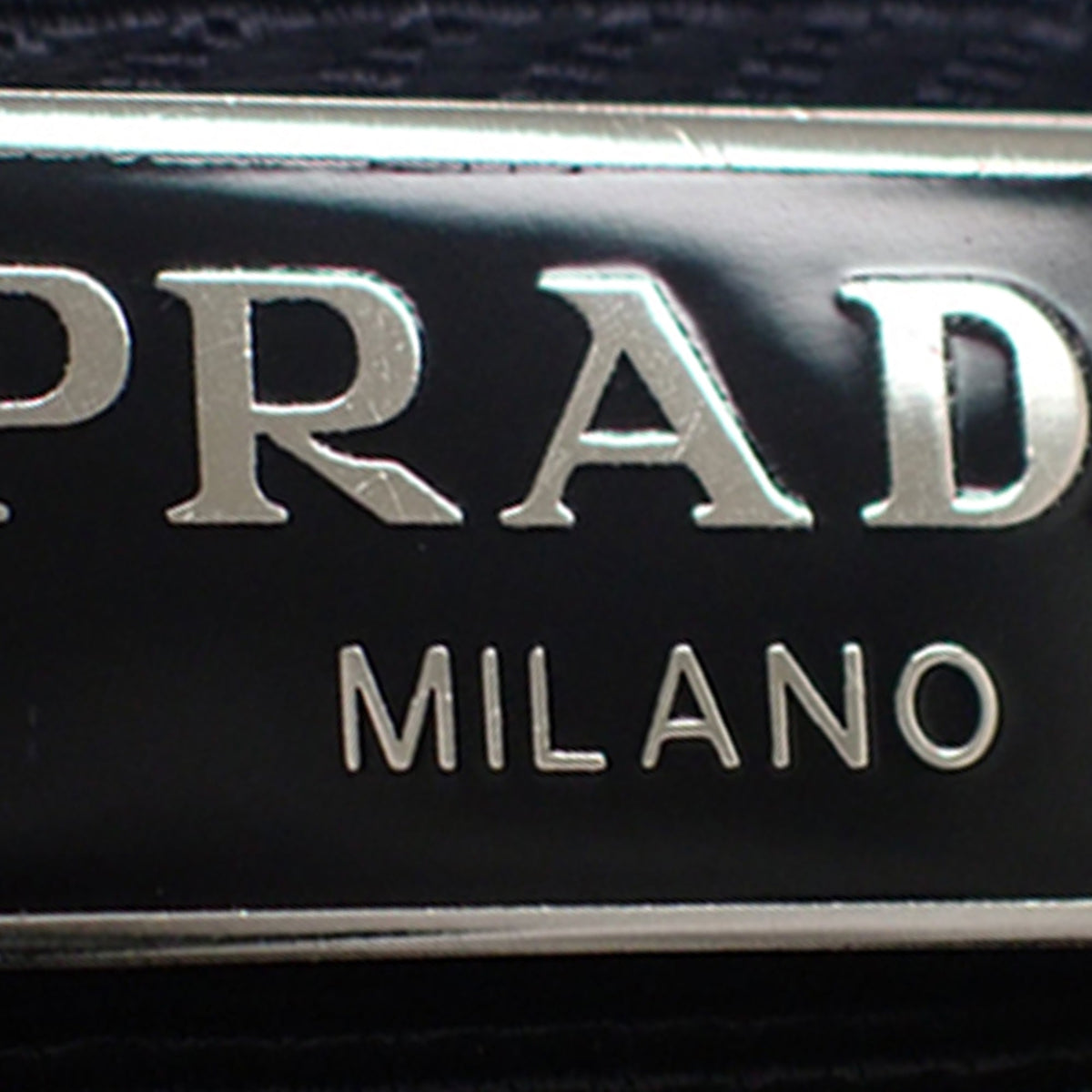 Prada Mini Saffiano Trimmed Tessuto Drawstring Vela Backpack