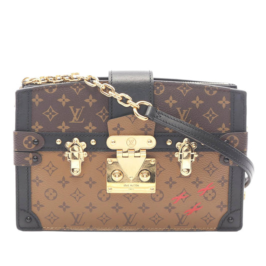 Louis Vuitton Monogram Reverse Trunk Clutch