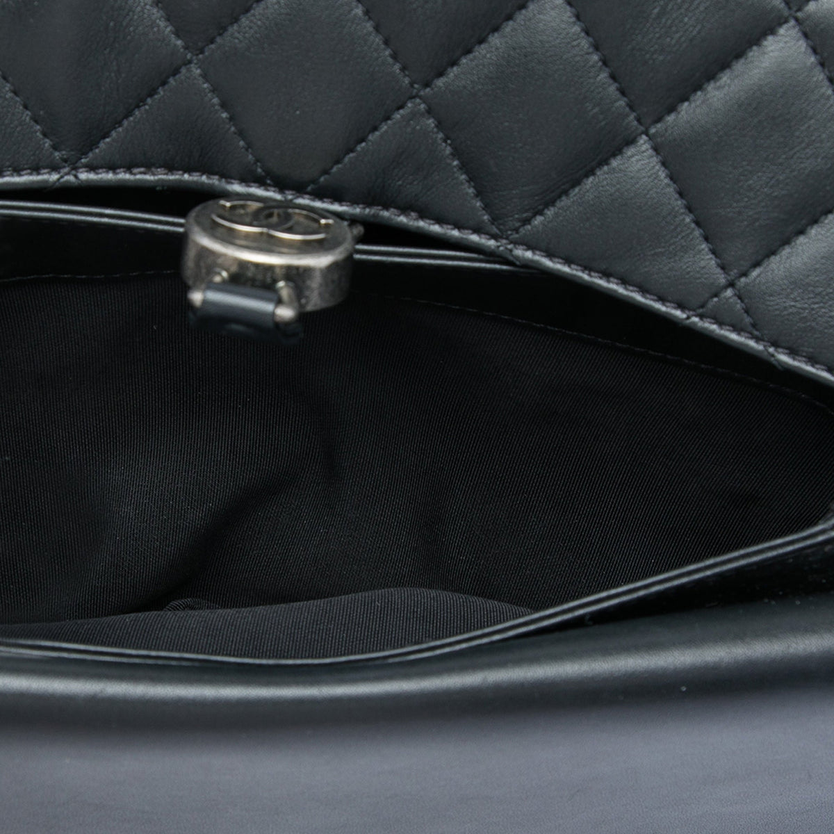 Chanel Quilted Lambskin CC Round Clasp Accordion Flap