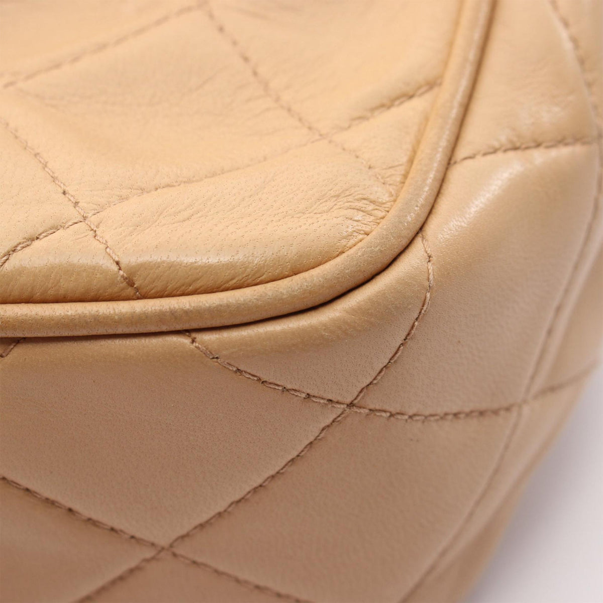 Chanel CC Quilted Lambskin Handbag — Beige