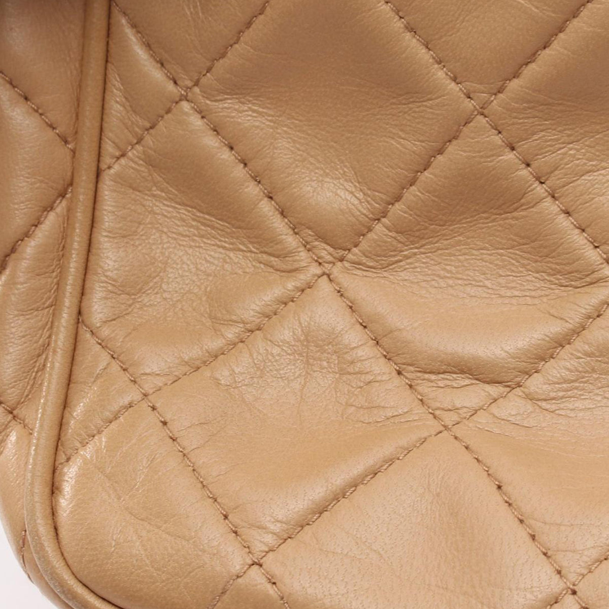 Chanel CC Quilted Lambskin Handbag — Beige