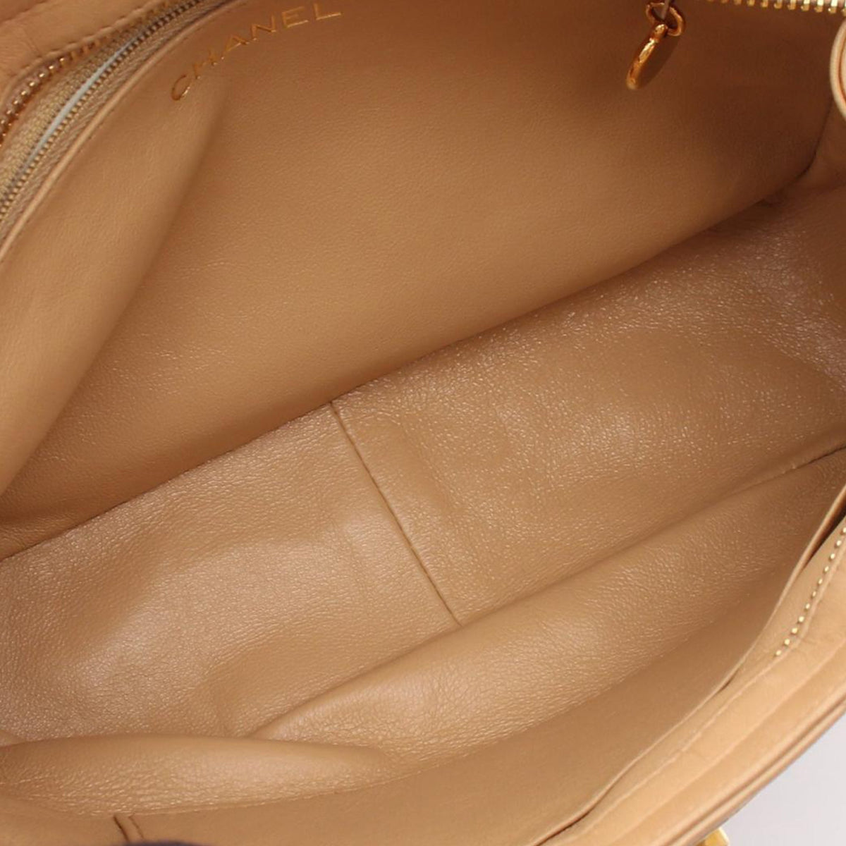 Chanel CC Quilted Lambskin Handbag — Beige