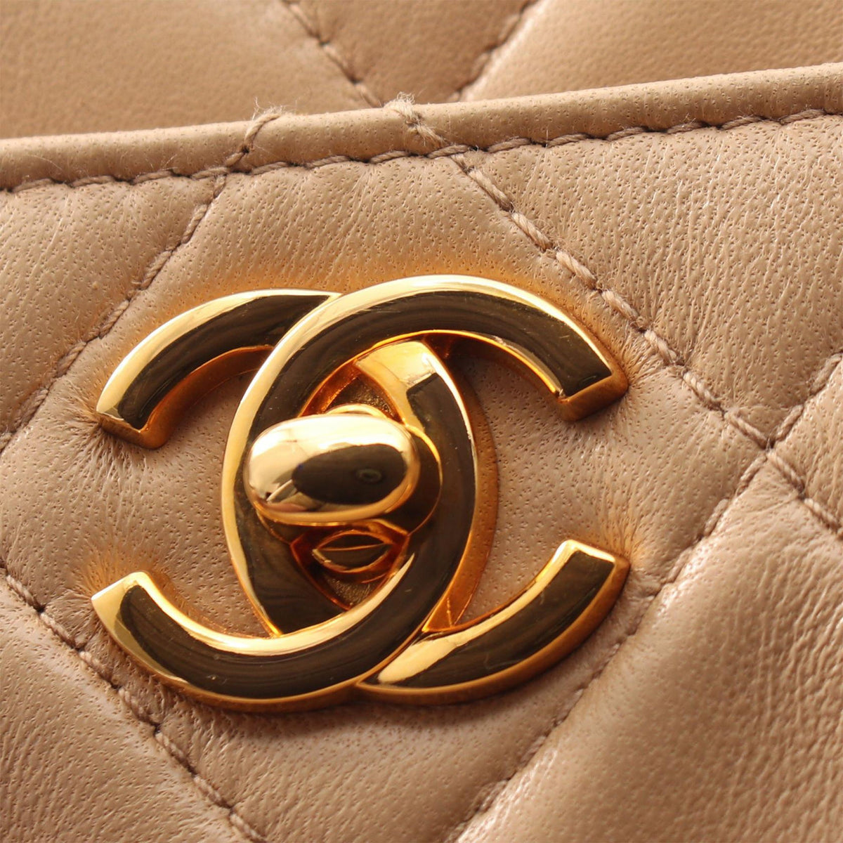 Chanel CC Quilted Lambskin Handbag — Beige