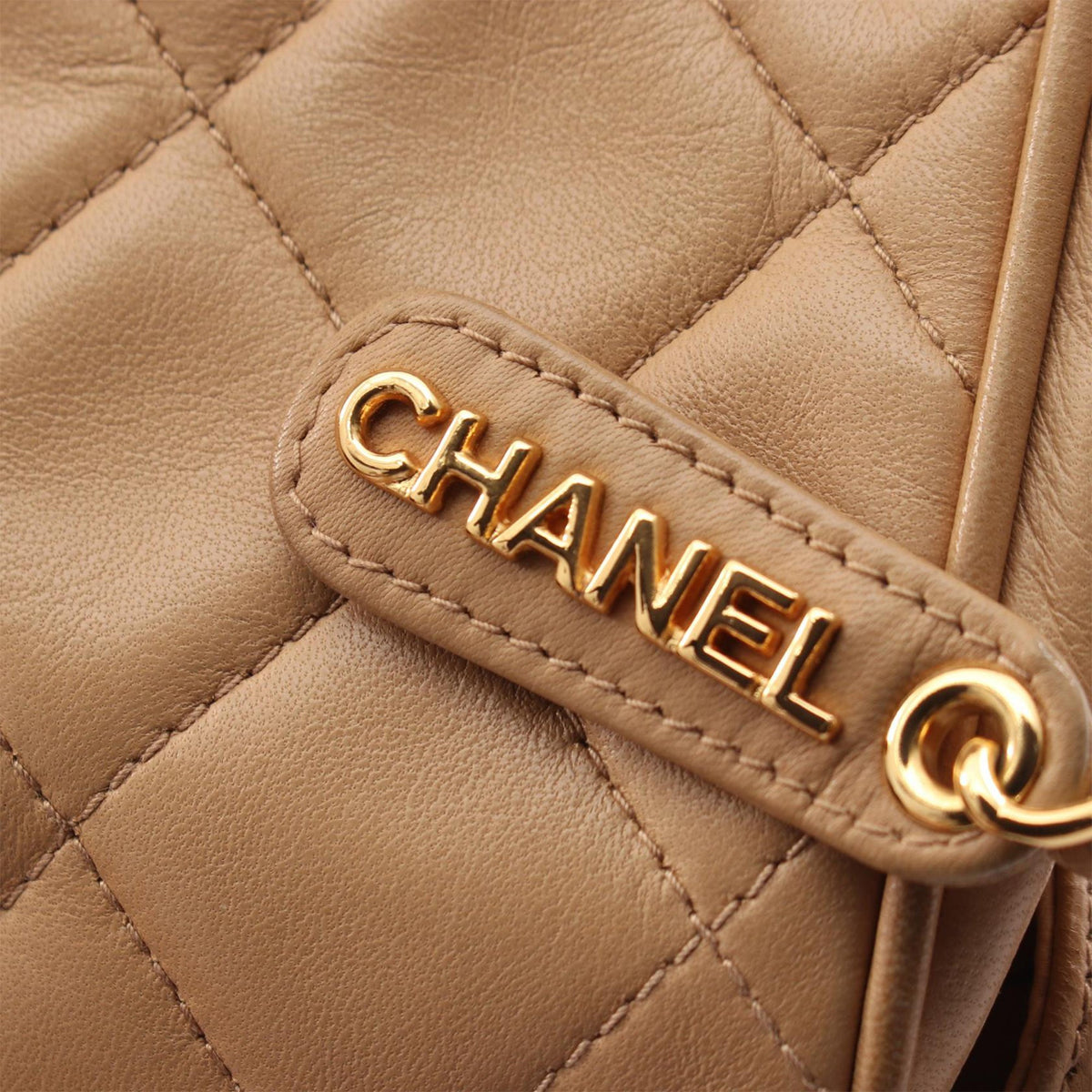Chanel CC Quilted Lambskin Handbag — Beige