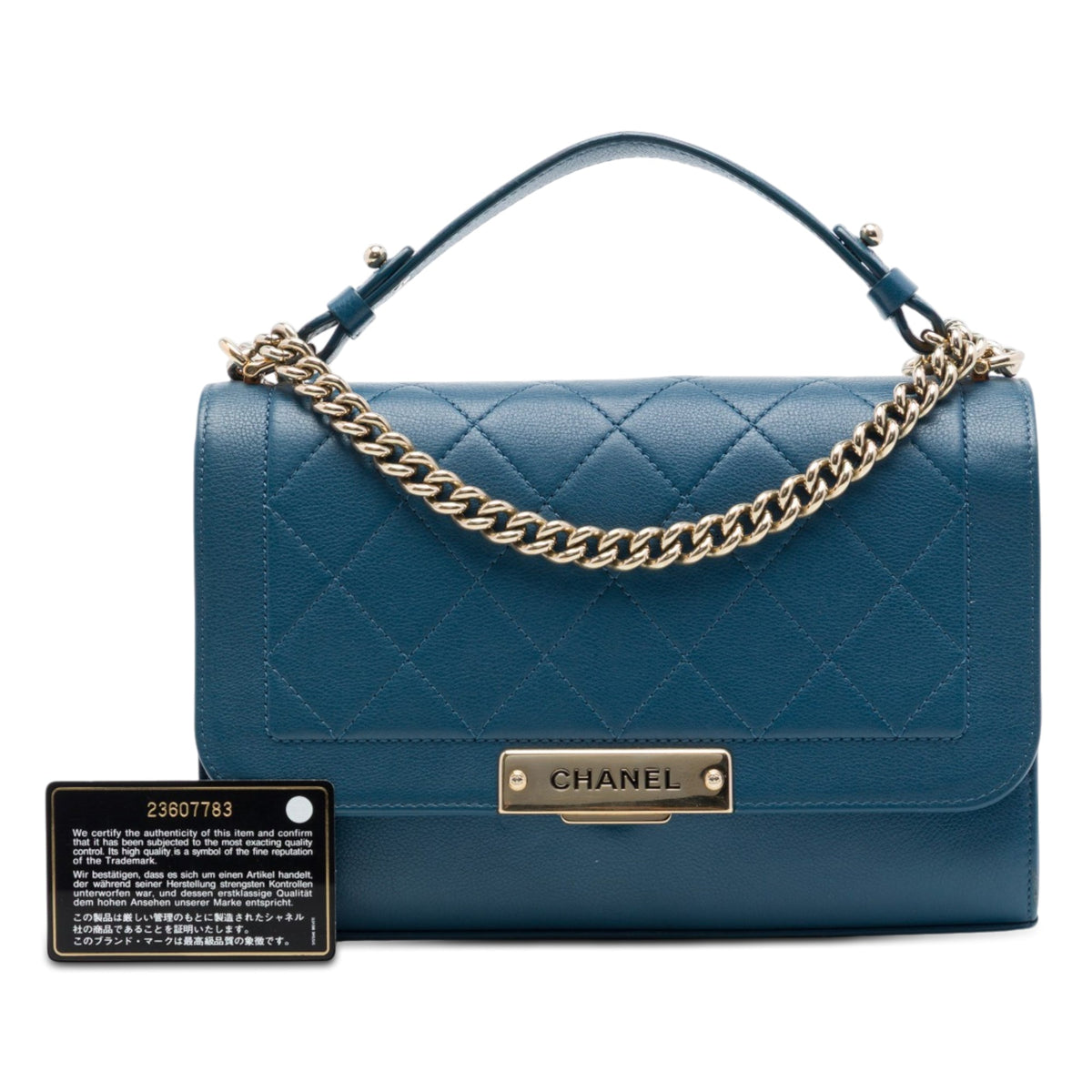 Chanel Medium Quilted Grained Calfskin Label Click Top Handle Flap