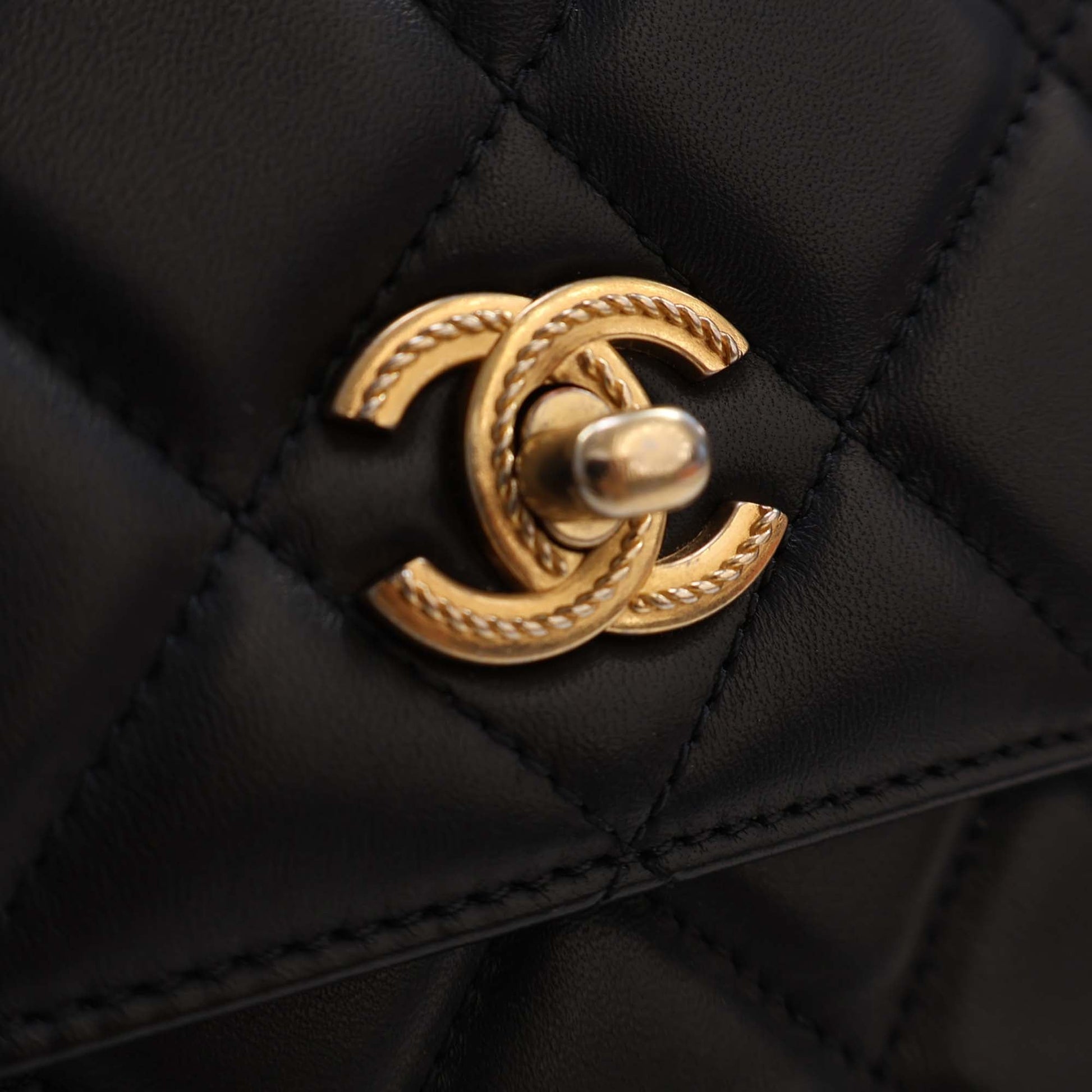 Chanel CC Quilted Lambskin Metal Twist Top Handle Flap