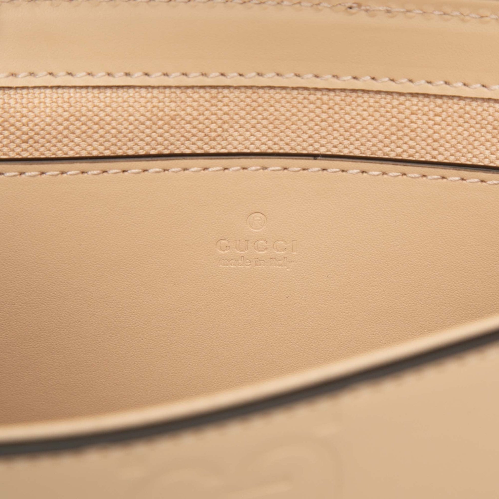 Gucci Super Mini GG Jumbo Embossed Leather Pochette