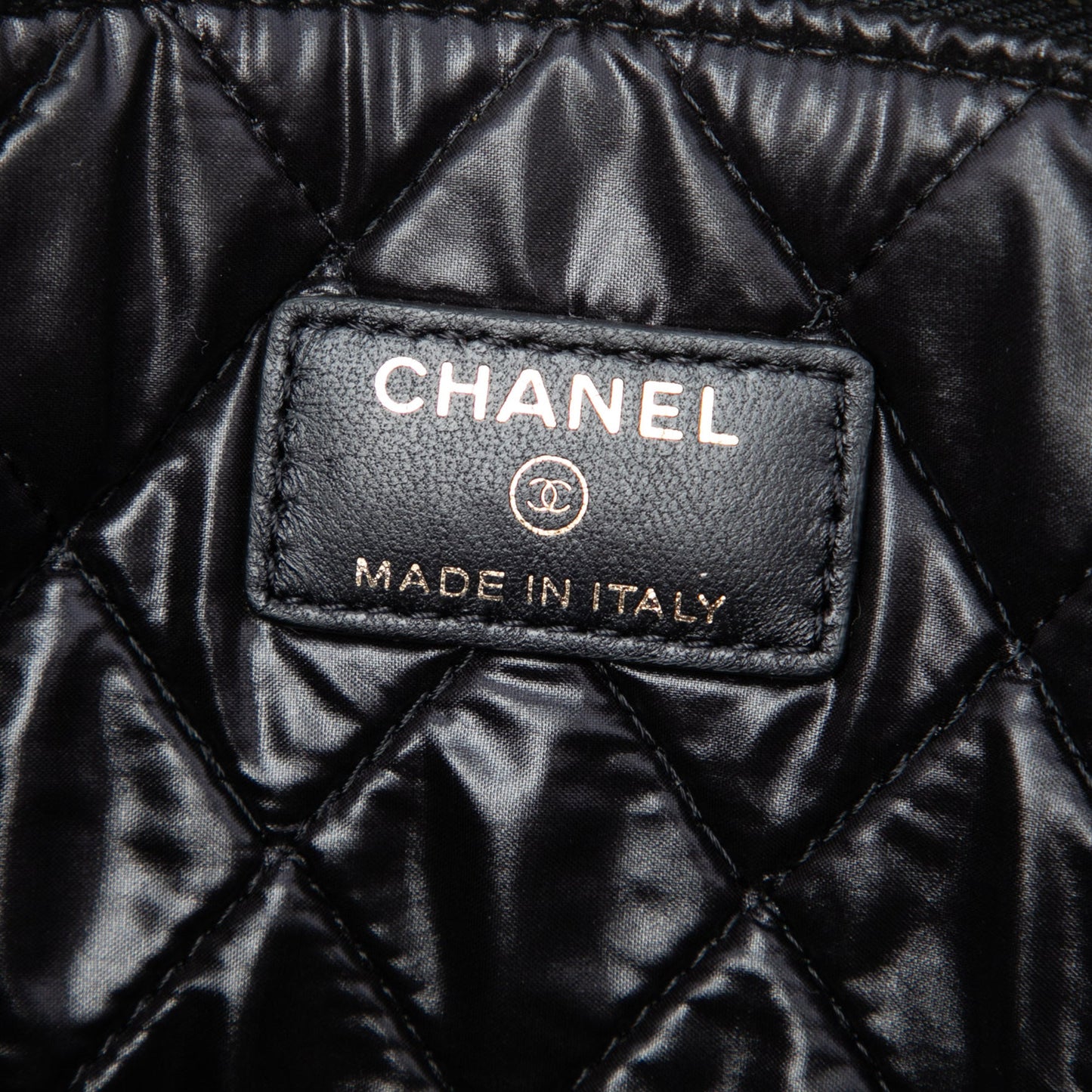 Chanel Large Quilted Lambskin Camellia O Case Clutch