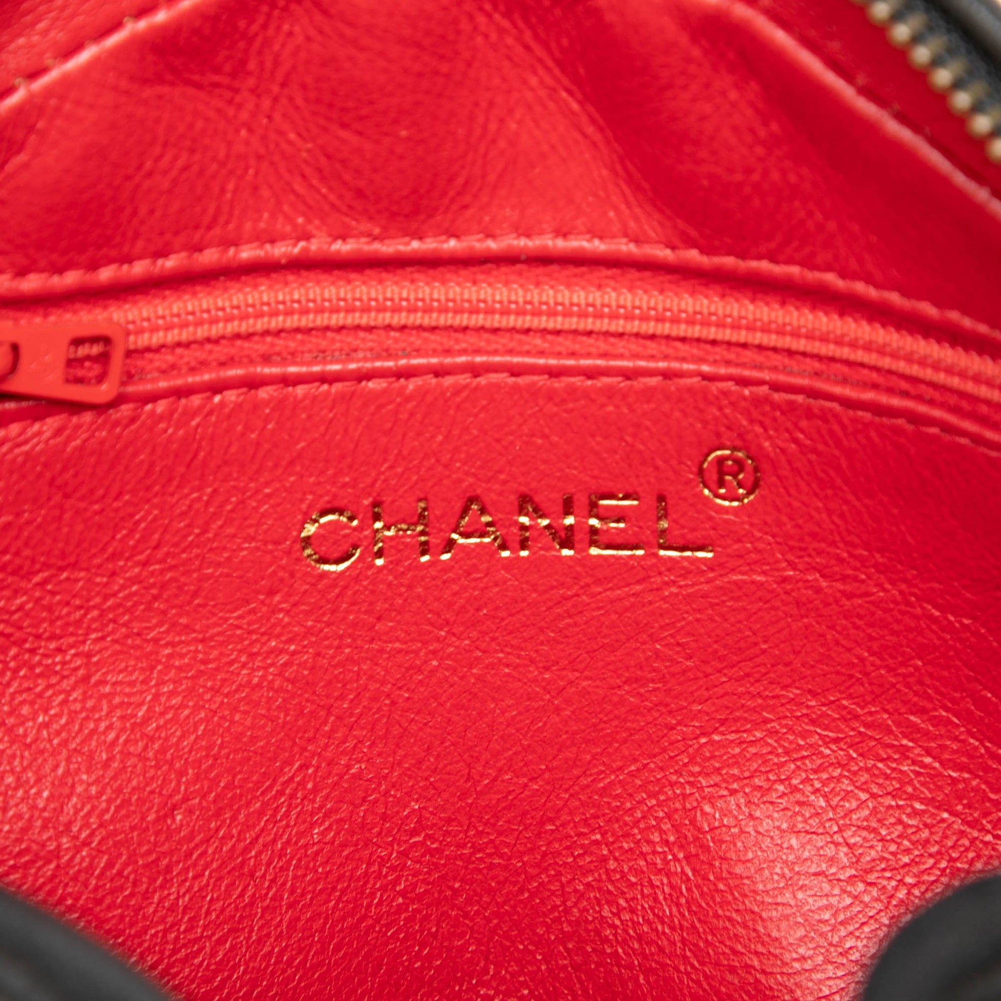 Chanel CC Quilted Satin Tassel Clutch