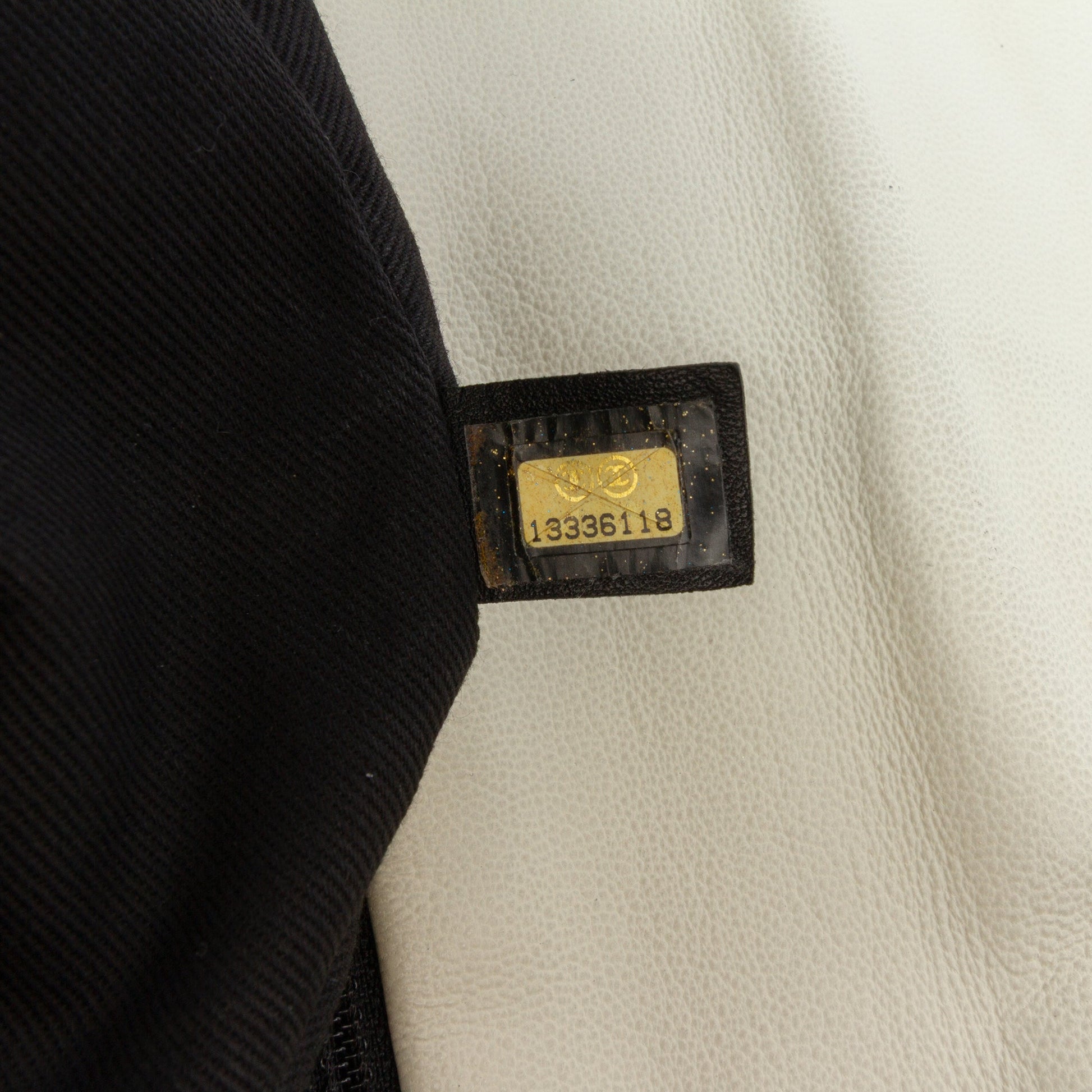 Chanel Quilted Calfskin Expandable Zip Yacht Flap