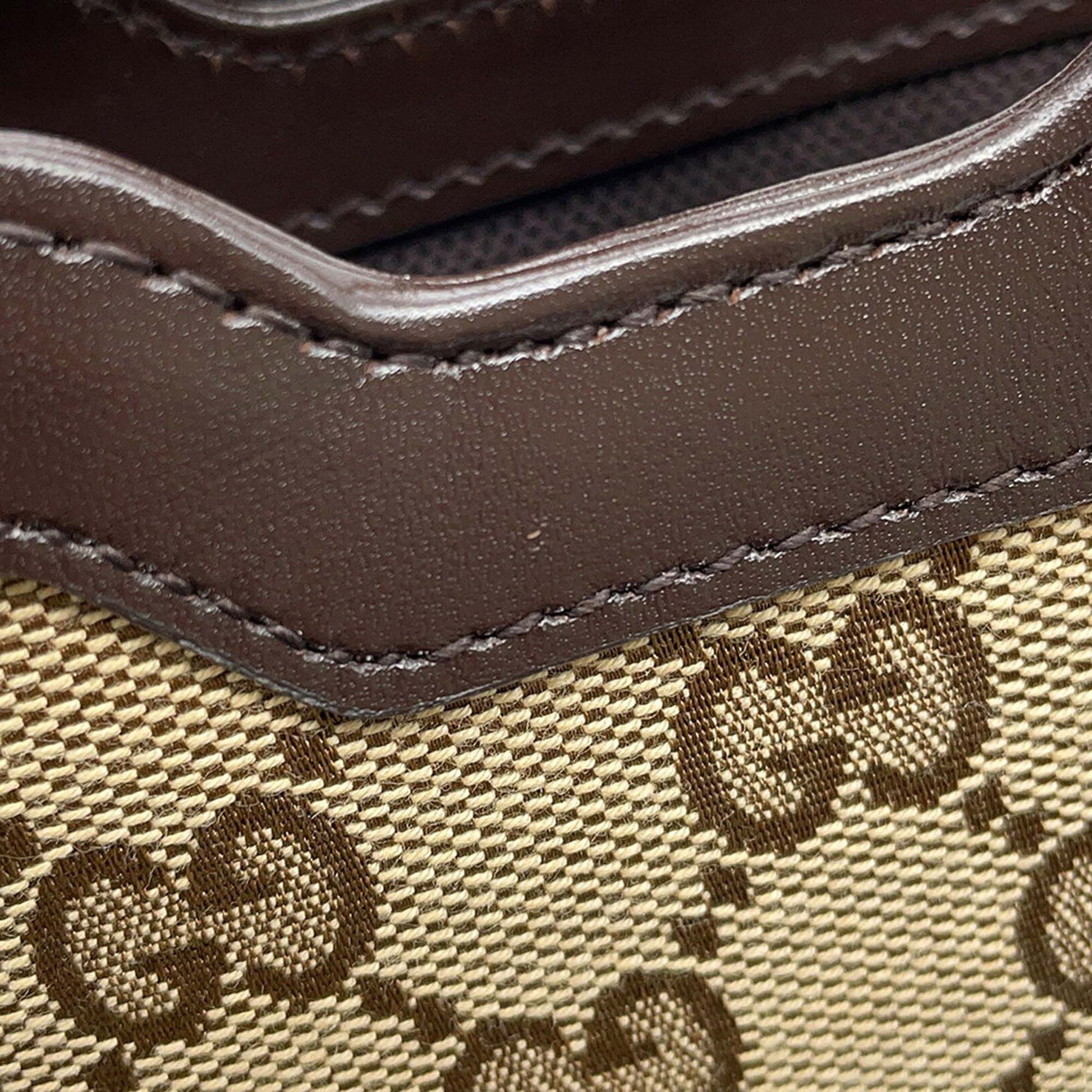 Gucci Mini GG Canvas Web Bucket Bag