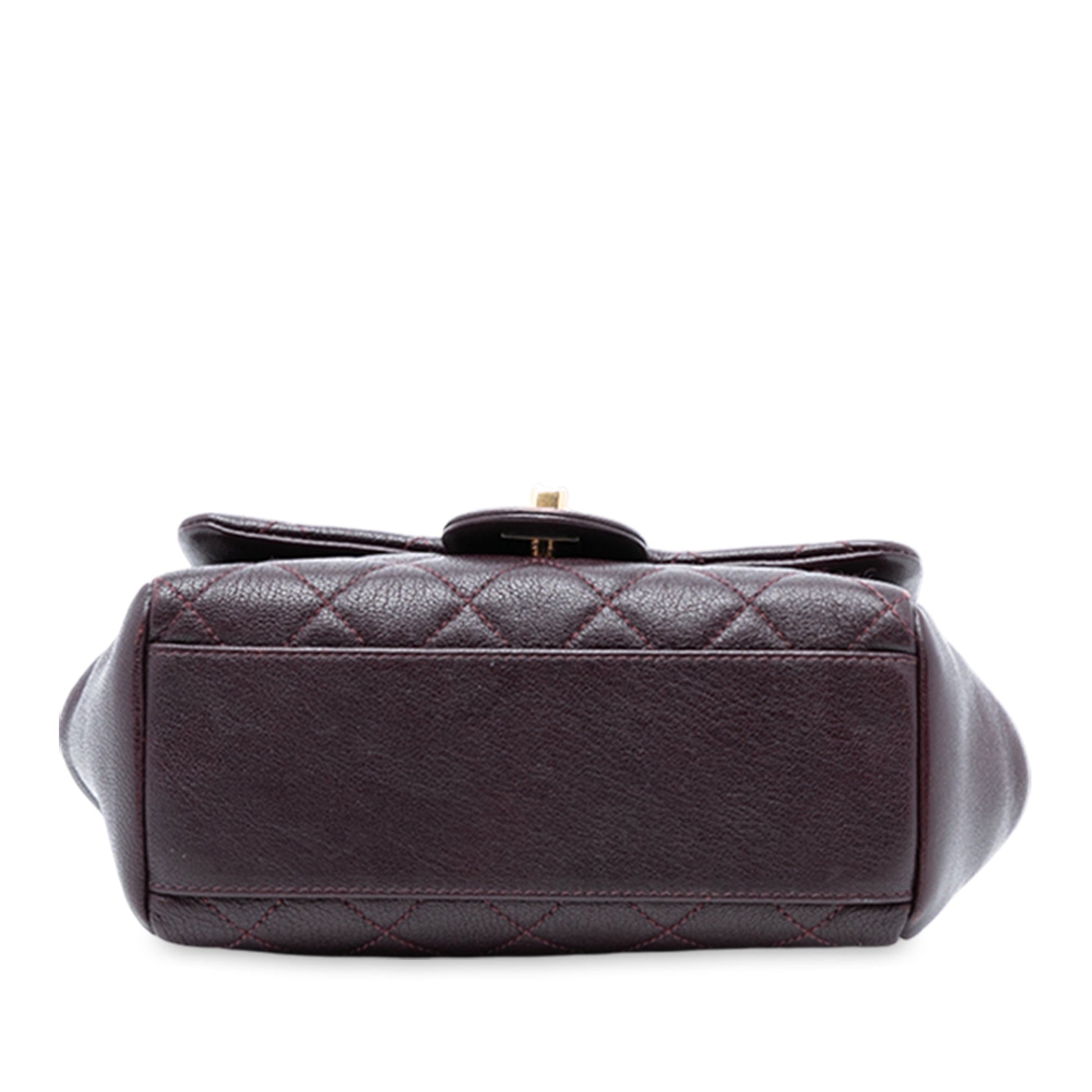 Chanel Mini Quilted Sheepskin Trapezio Flap