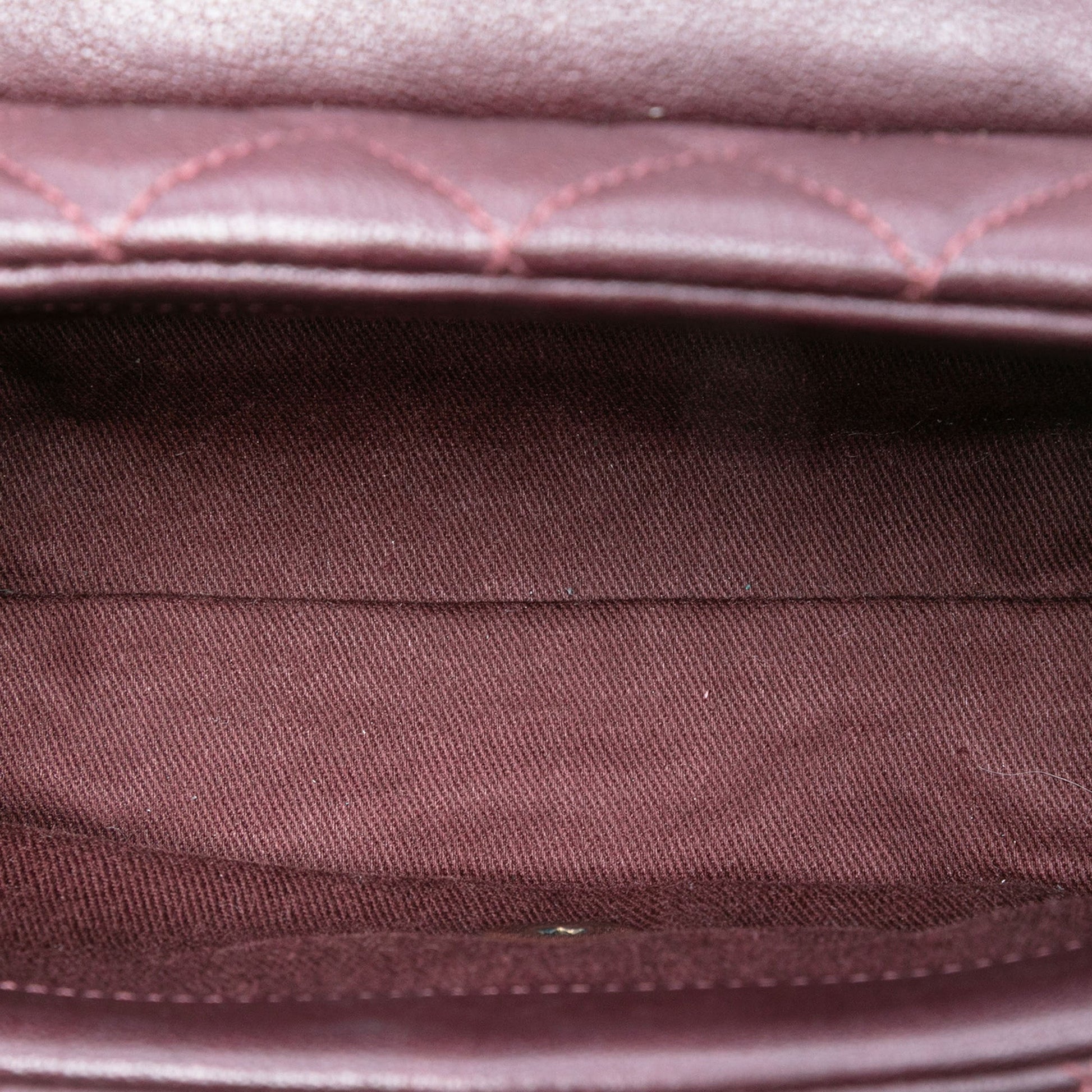 Chanel Mini Quilted Sheepskin Trapezio Flap