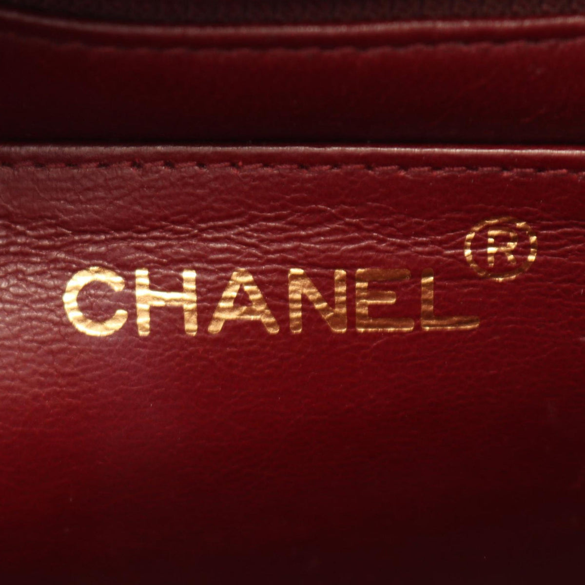 Chanel CC Vertical Quilted Lambskin Top Handle Flap