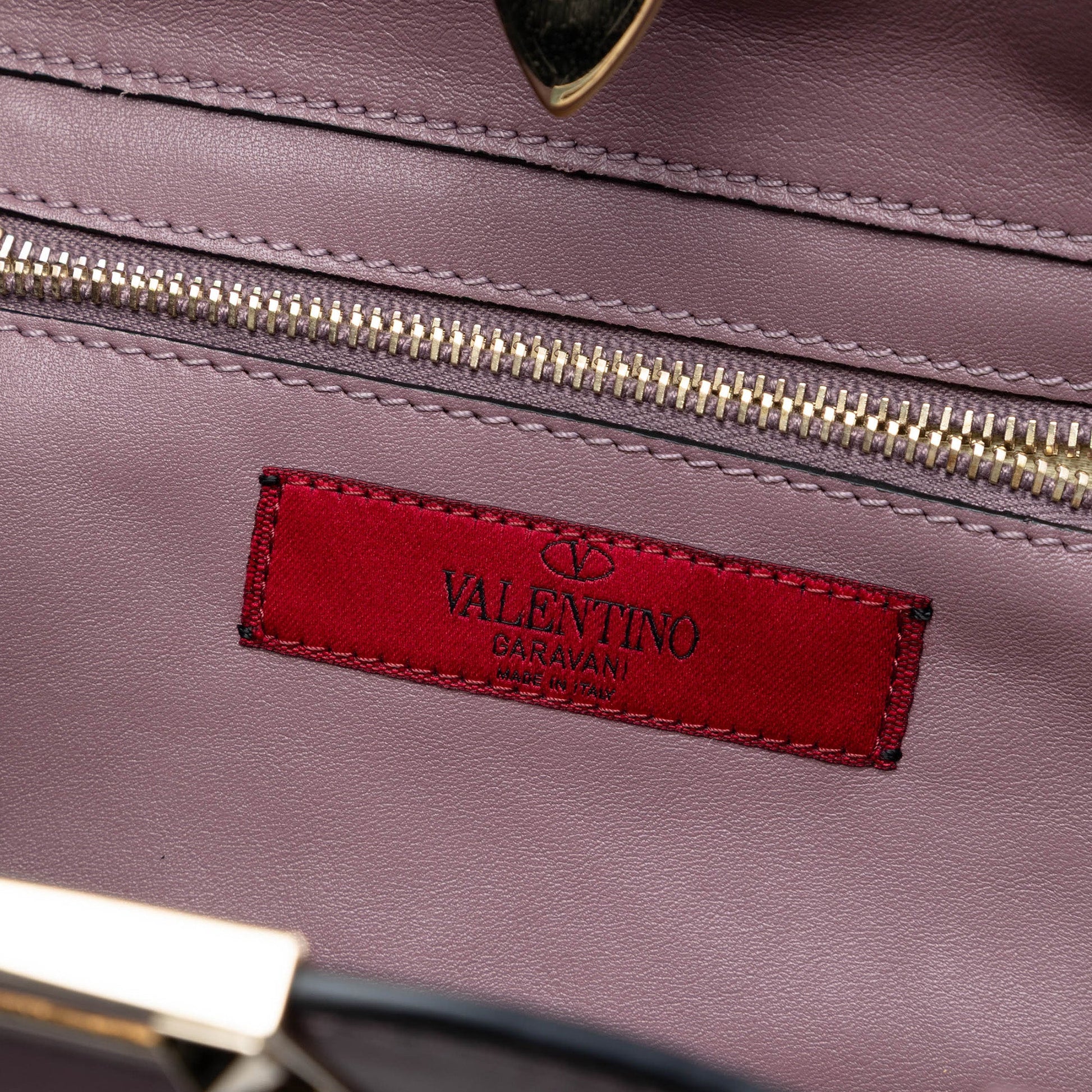 Small Grained Calfskin Rockstud Trapeze Satchel