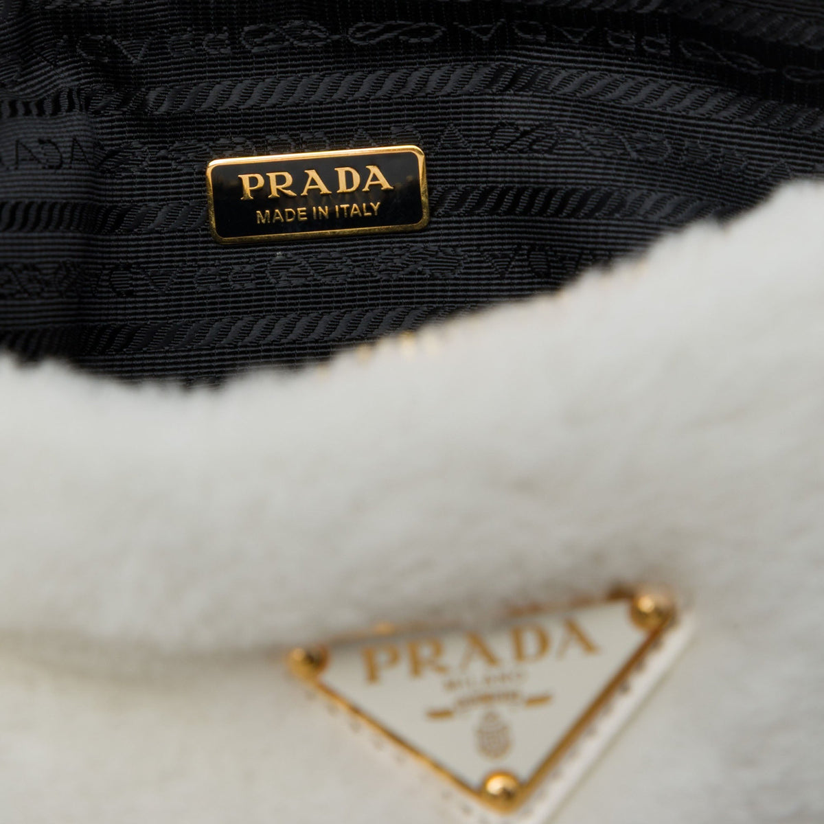 Prada Mini Shearling Triangle Satchel — White