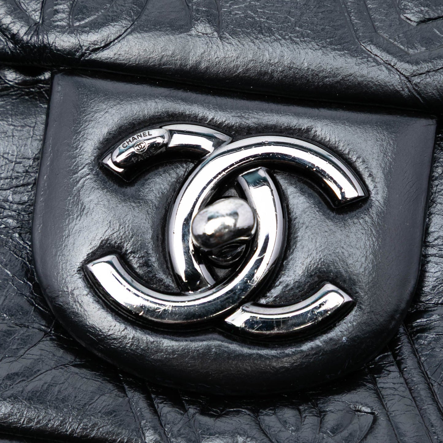 Chanel Medium Embossed Calfskin Precious Symbols Flap