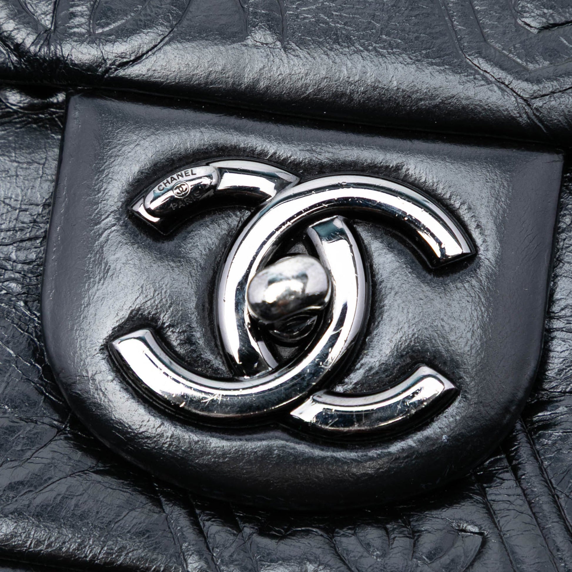 Chanel Medium Embossed Calfskin Precious Symbols Flap