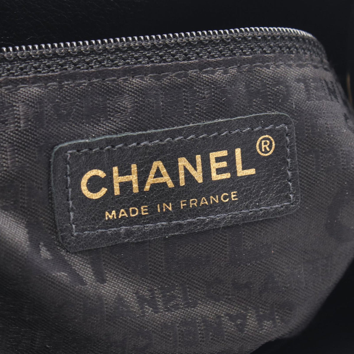 Chanel Lambskin Embossed Camellia Logo Tote