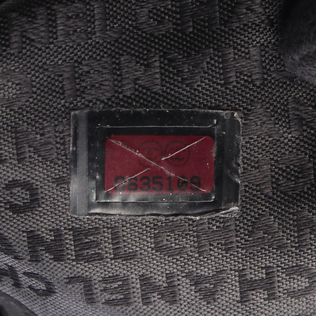 Chanel Lambskin Embossed Camellia Logo Tote