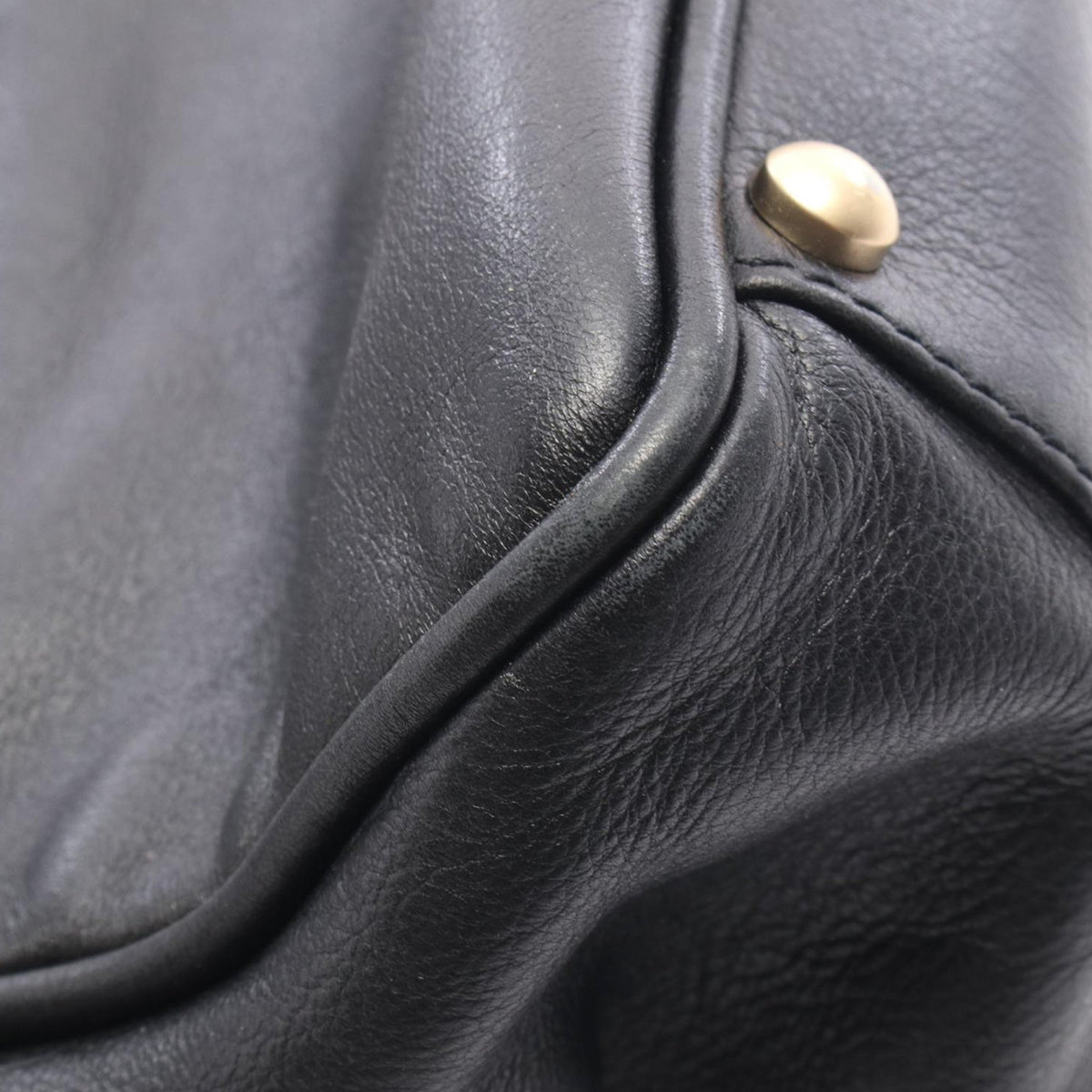 Chanel Lambskin Embossed Camellia Logo Tote