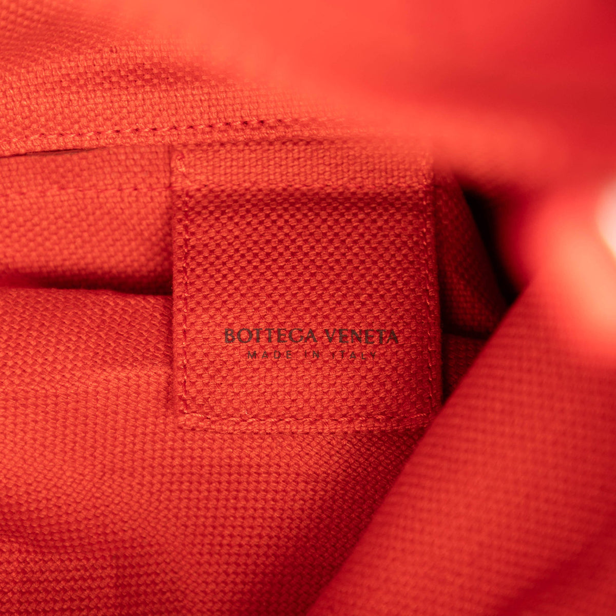 Bottega Veneta Rubber Intrecciato Buffer Backpack — Red