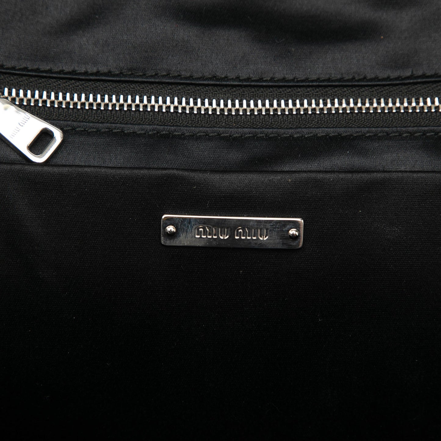 Miu Miu Leather Trimmed Matelasse Crystal Embellished Nylon Backpack