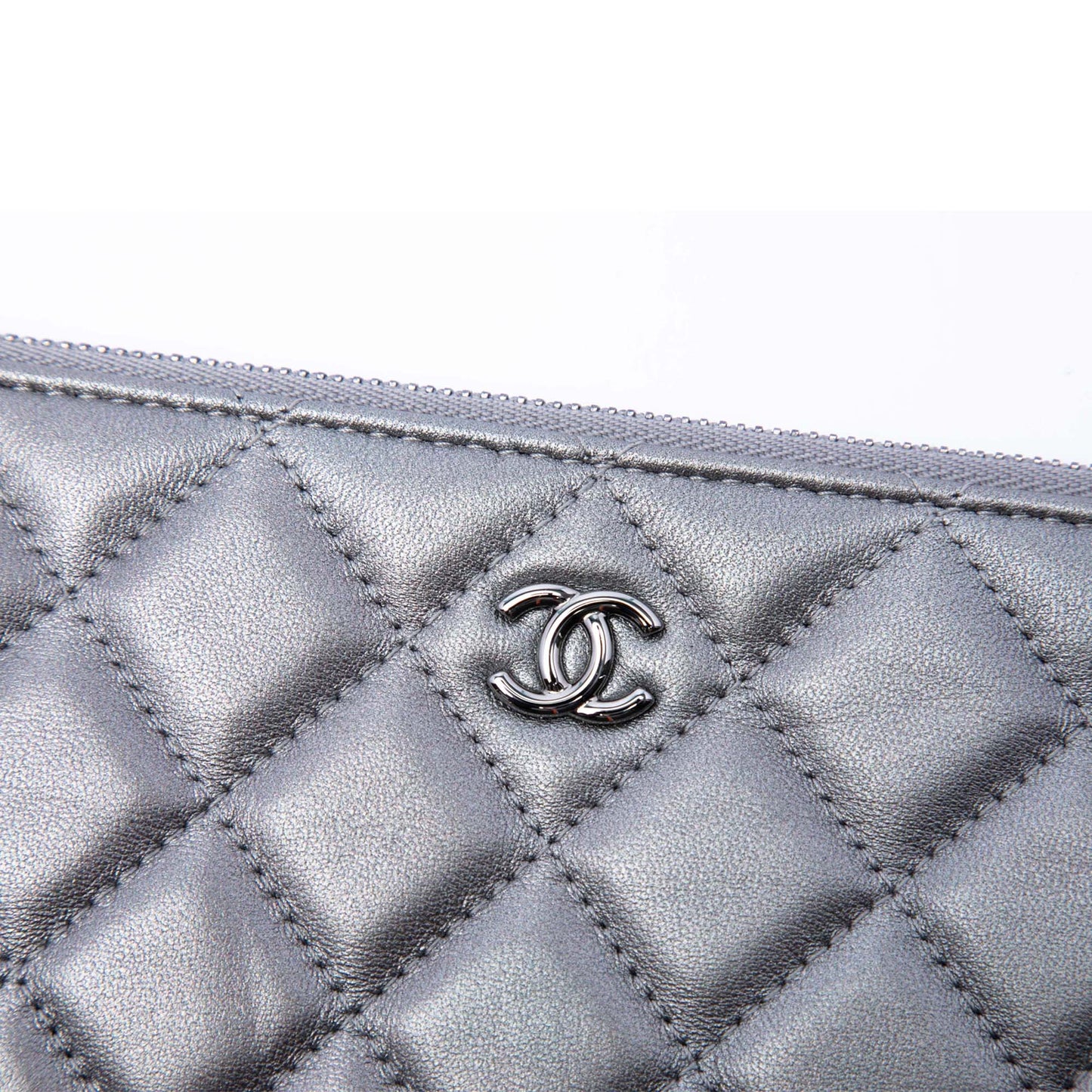 Chanel Medium Quilted Metallic Lambskin O Case Clutch