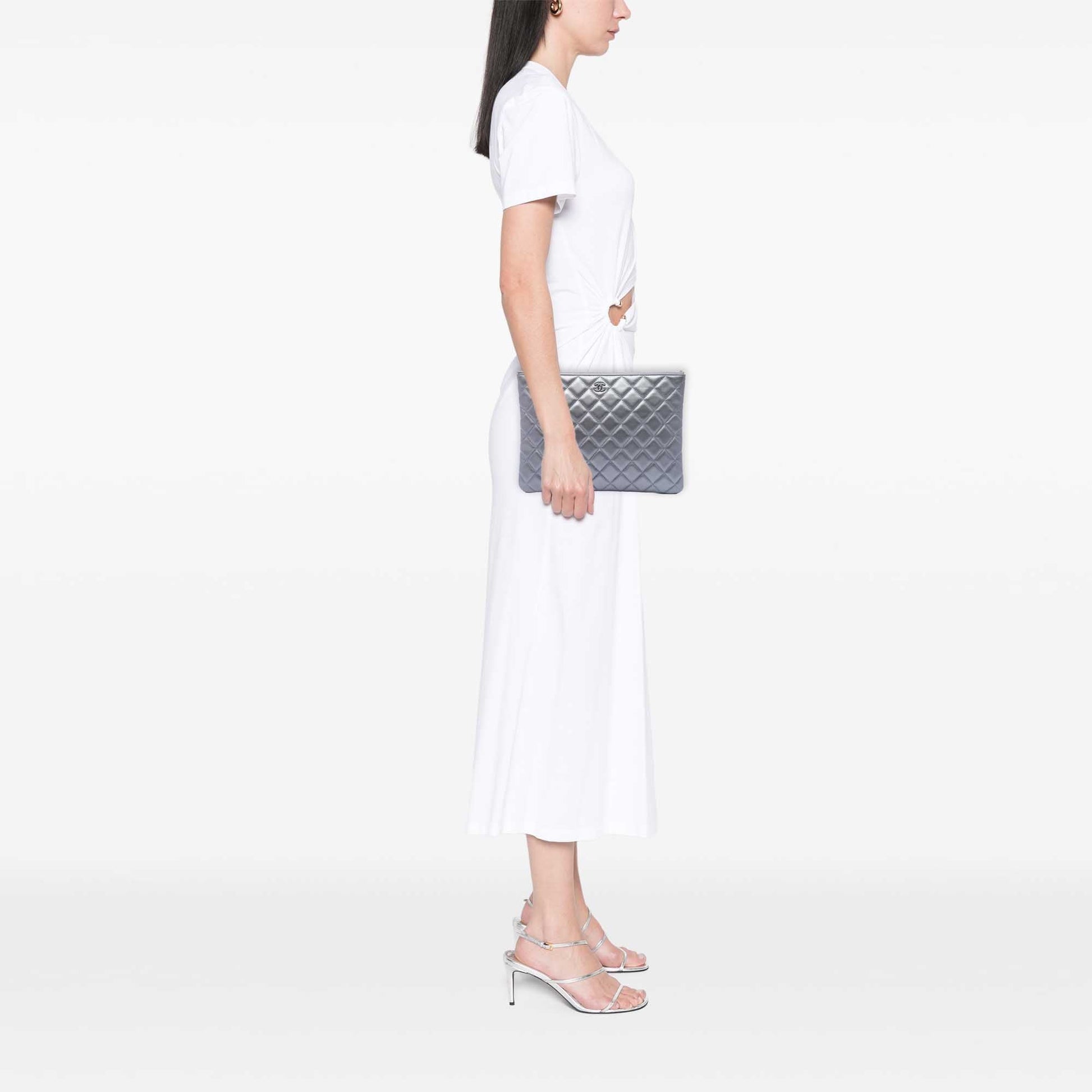 Chanel Medium Quilted Metallic Lambskin O Case Clutch