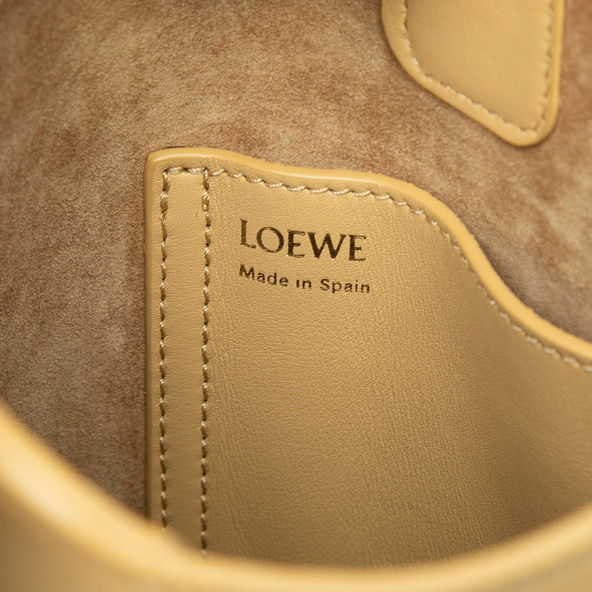 LOEWE Mini Calfskin Pebble Bucket Bag — Yellow