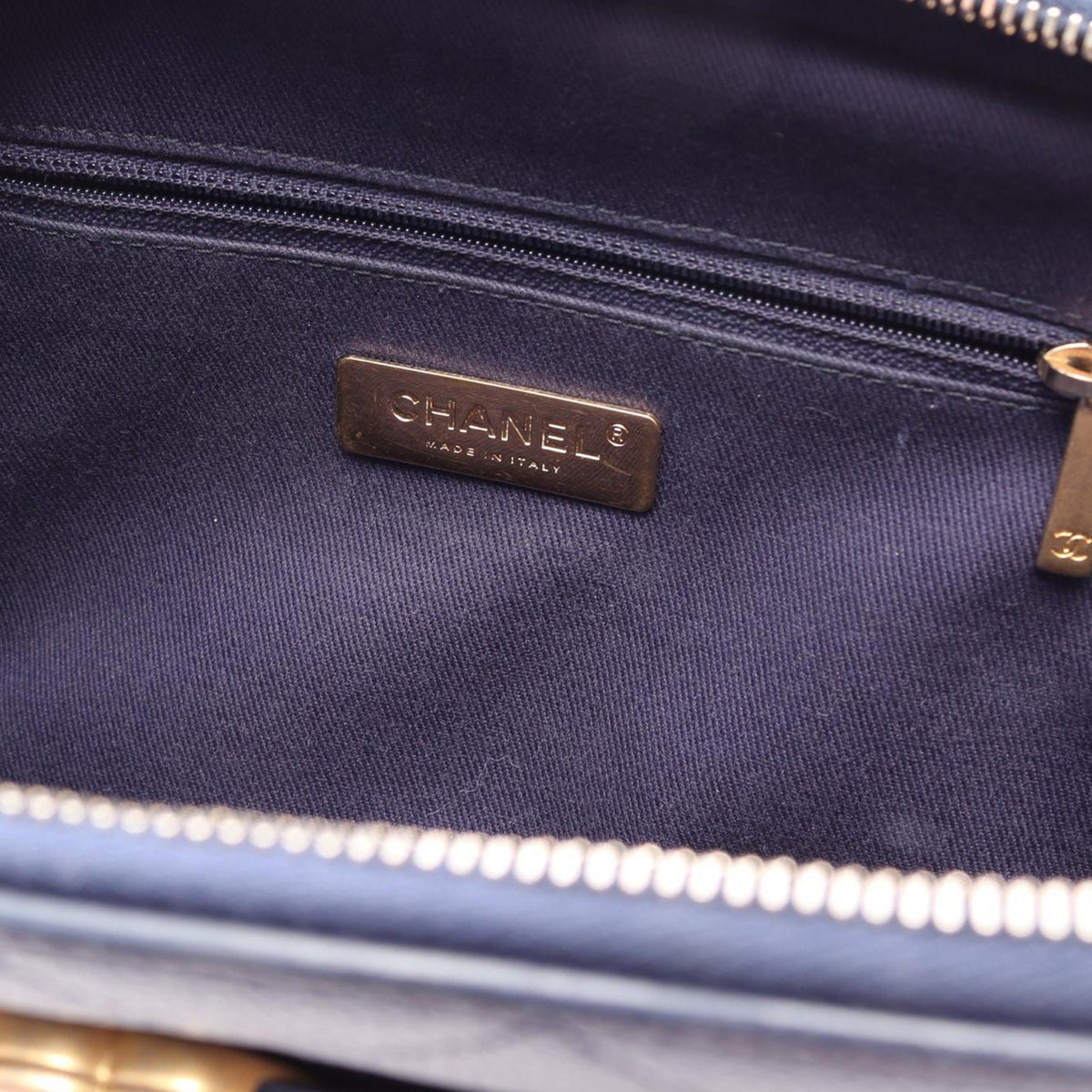 Chanel CC Quilted Caviar Top Handle Bag — Blue