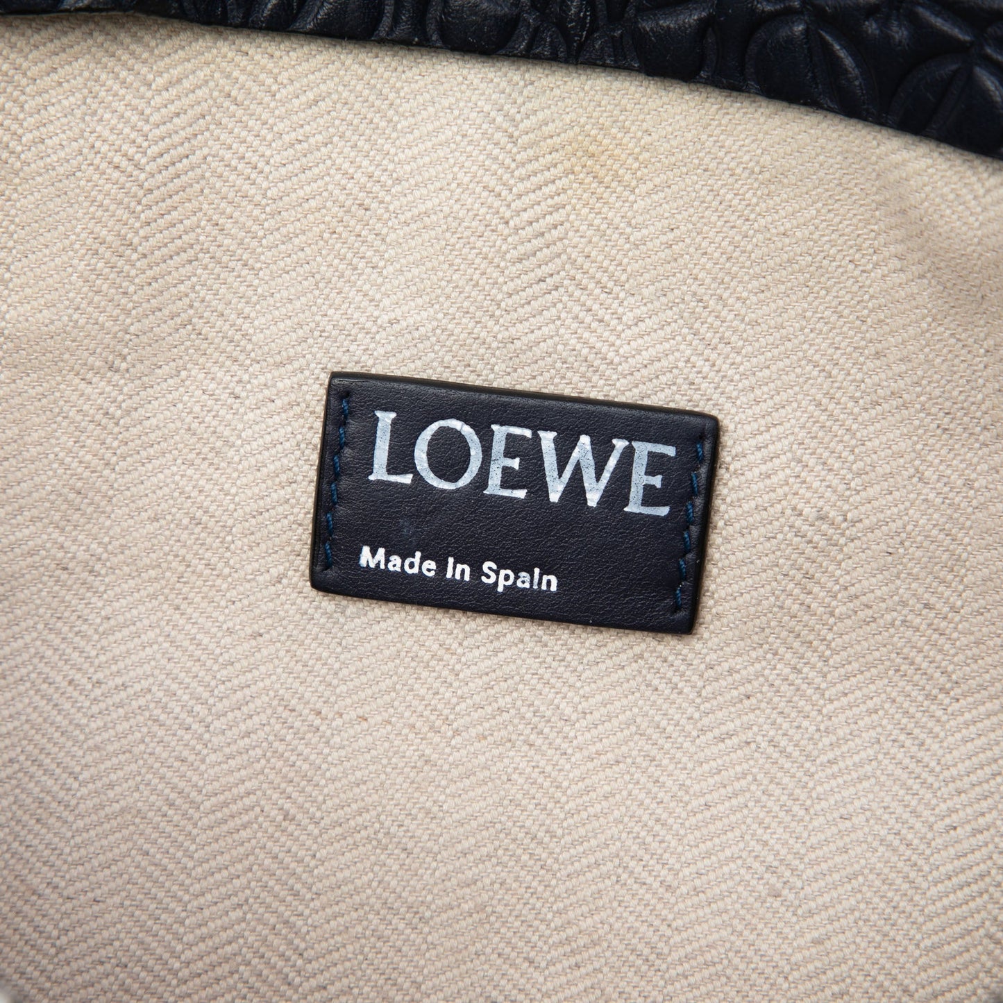 LOEWE Embossed Anagram Leather Repeat T Clutch