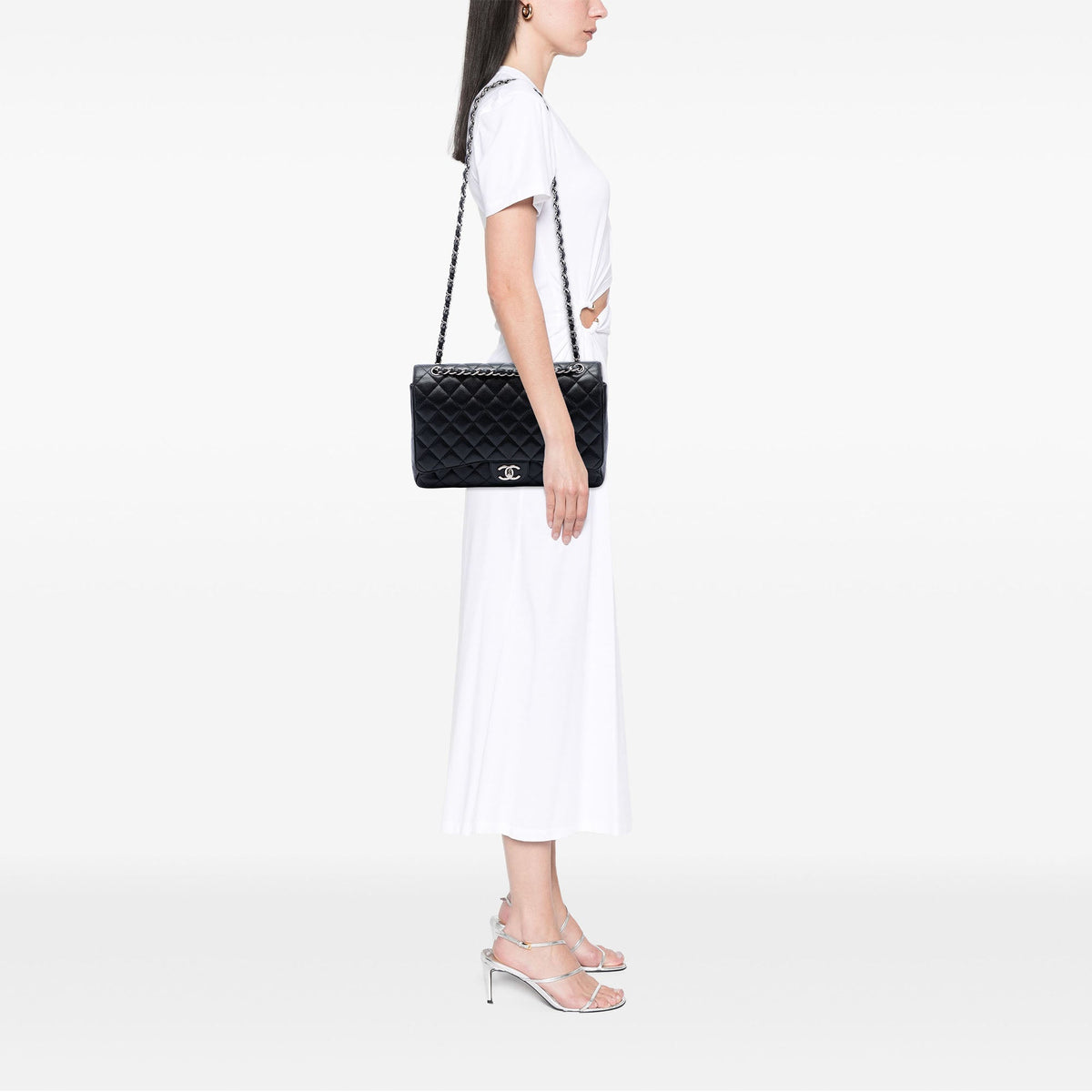 Chanel Maxi Classic Caviar Double Flap — Black