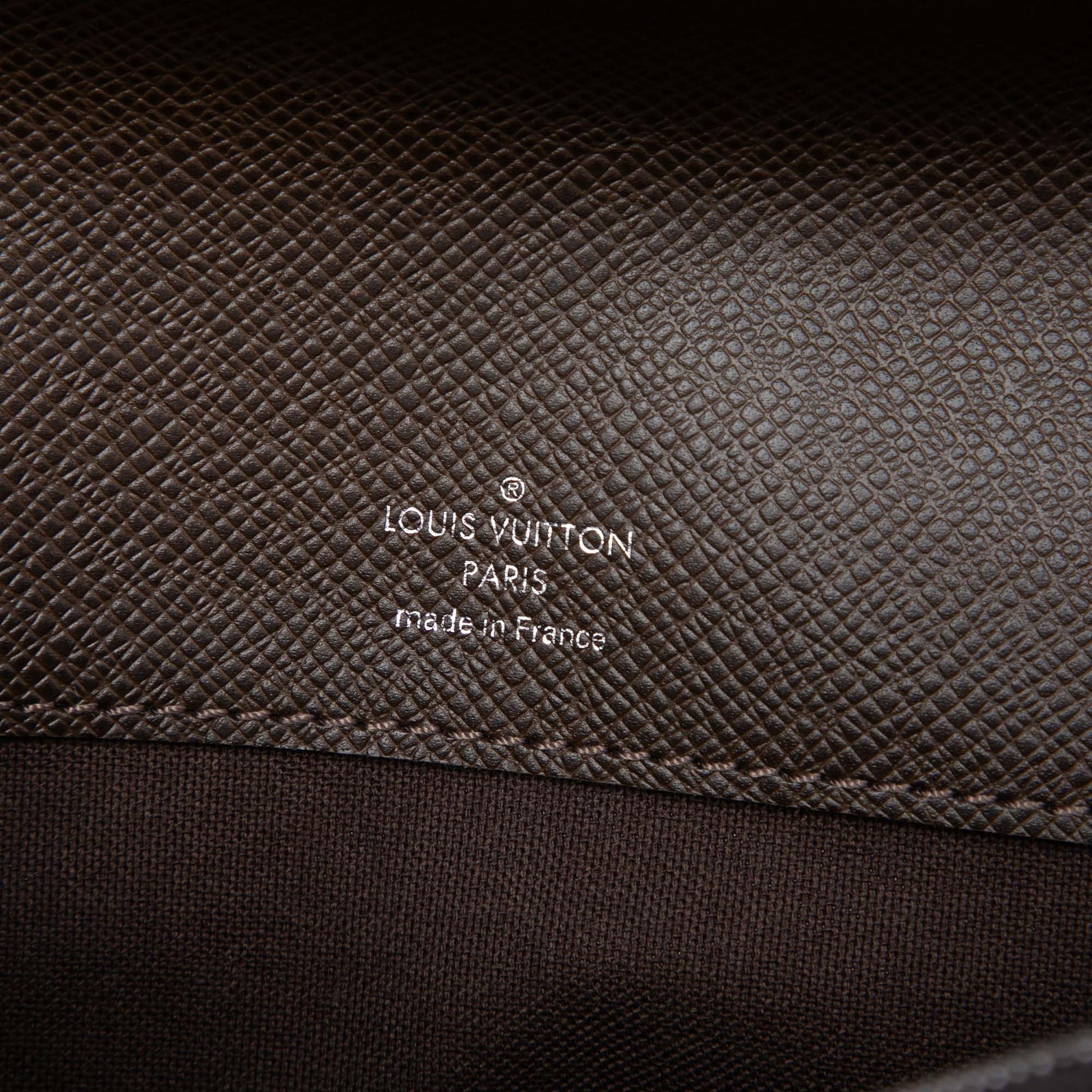 Louis Vuitton Taiga Belaia Clutch
