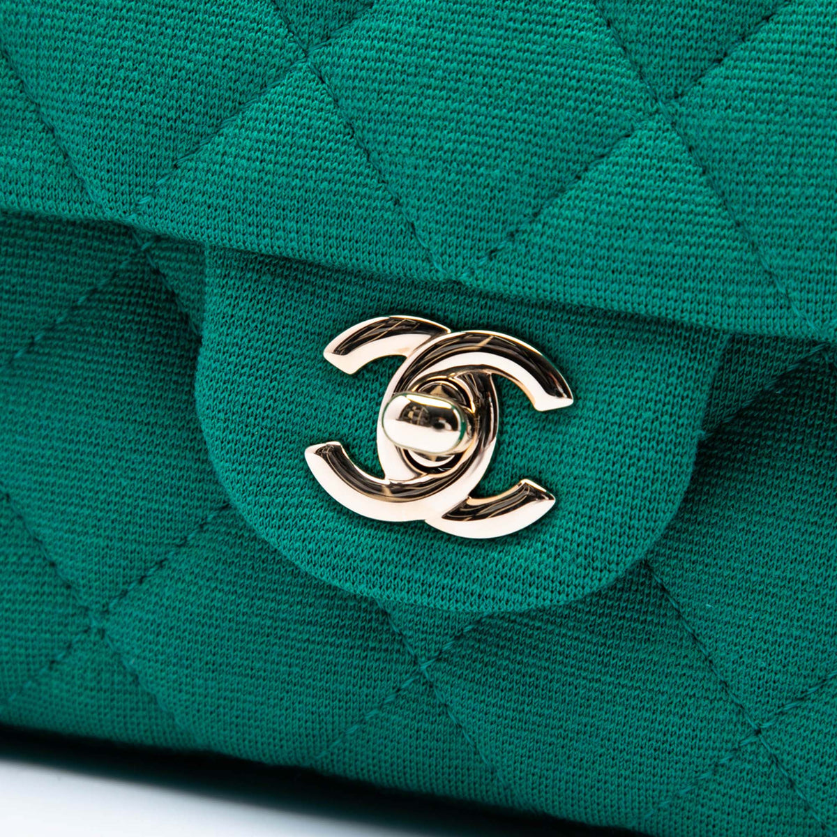 Chanel CC Quilted Jersey Roll Clutch