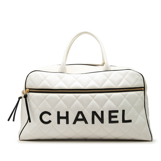 Chanel Quilted Lambskin Grand Logo Duffle Bag